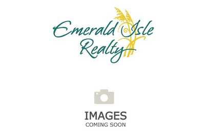 The Emerald Isle Realty logo featuring teal text and golden sea oats symbolizes coastal vacation living.
